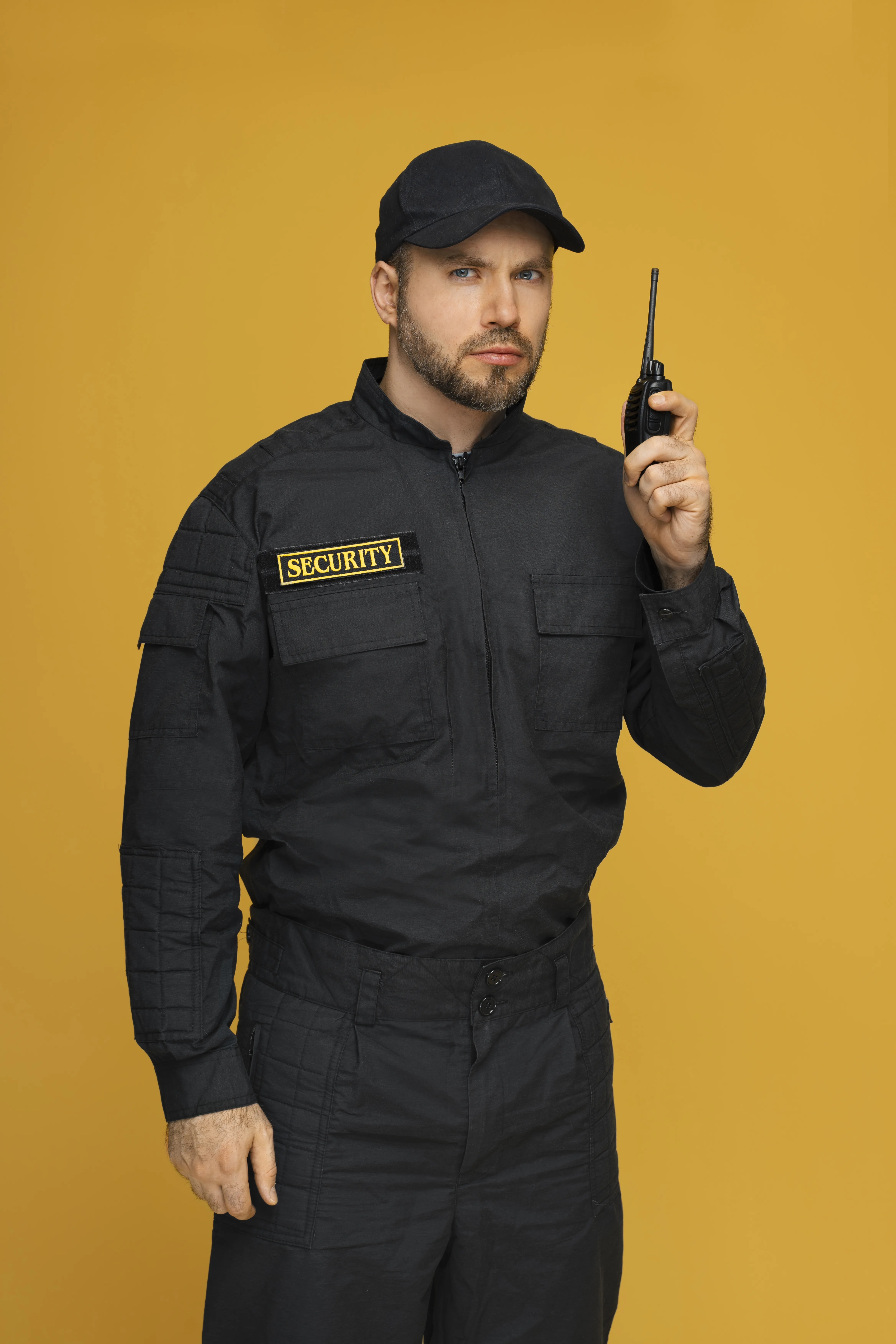A professional and confident BlueStar security guard in uniform, representing career opportunities in Karnataka.